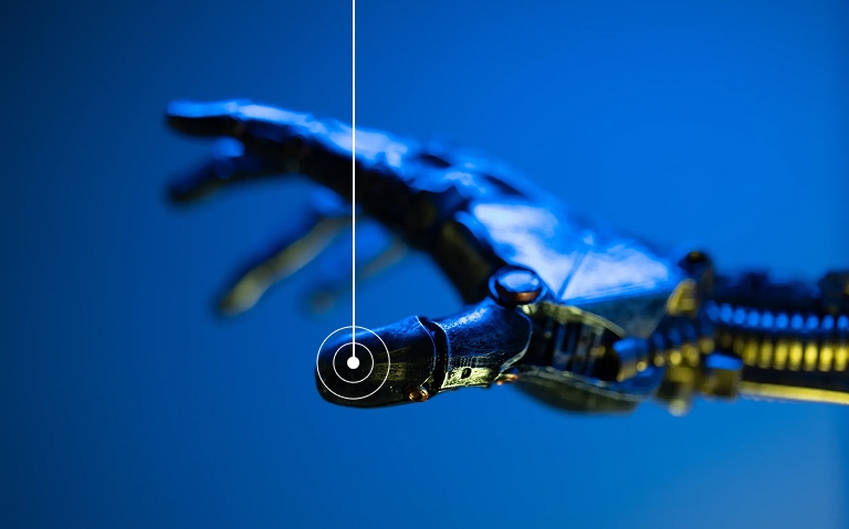 机械手，代表与现实世界交互的物理 AI。